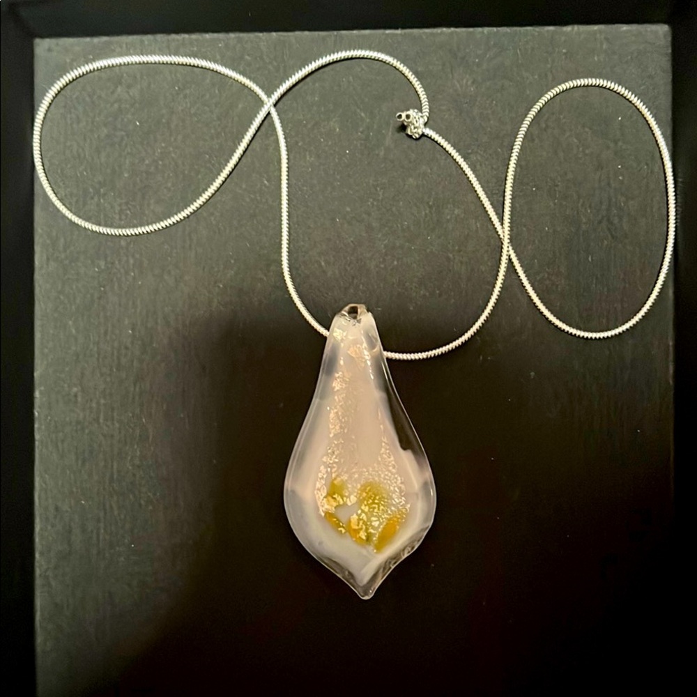 Glass Pendant Necklace. White with gold - silver accent on silver elastic